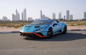Experience the Lamborghini Huracán STO in eye-catching sky blue and orange. A street-legal race car with a 640 hp V10 engine and precision handling. Rent it today with LuxeRidez Dubai.