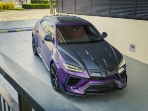 Purple and black Lamborghini Urus Mansory edition front angle view
