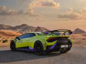 Lamborghini Huracán STO 2023 green front view in Dubai desert