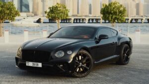 Black Bentley Flying Spur luxury sedan front view in Dubai
