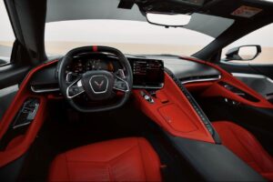 Chevrolet Corvette C8 with black racing stripe in Dubai desert