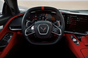 Chevrolet Corvette C8 with black racing stripe in Dubai desert