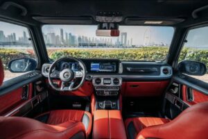 Black 2025 Mercedes-AMG G63 luxury SUV parked in front of luxury hotel in Dubai