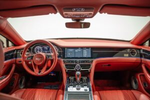 Black Bentley Flying Spur luxury sedan front view in Dubai
