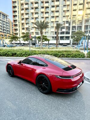 Rent Red Porsche 911 Carrera 2024 in Dubai | Luxeridez