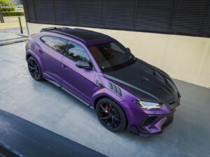 Purple and black Lamborghini Urus Mansory edition front angle view